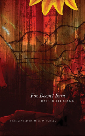 Fire Doesn't Burn [Hardcover] [Sep 15, 2012] Rothmann, Ralf and Mitchell, Mike]